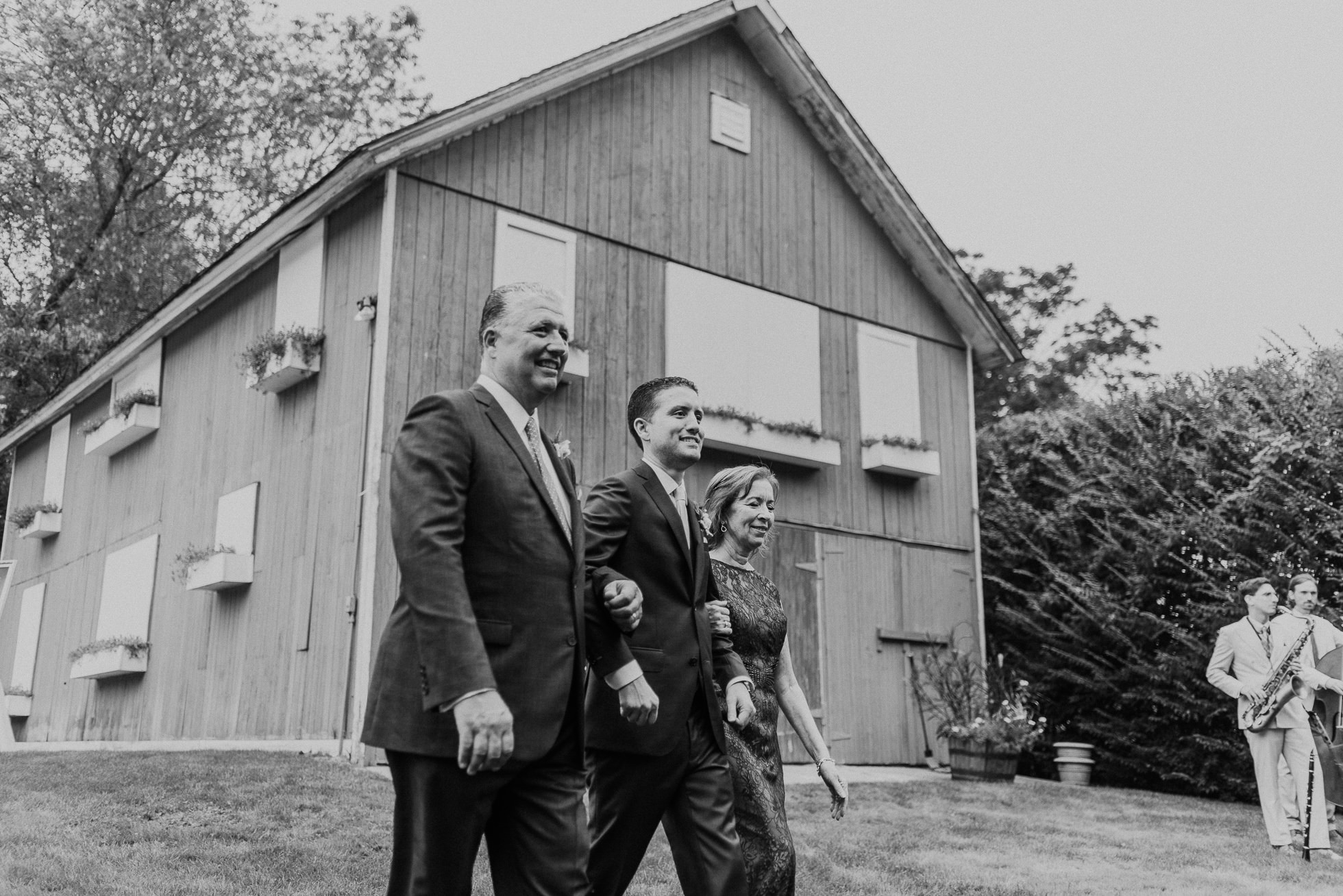 groom entrance outdoor ceremony the Hedges Inn