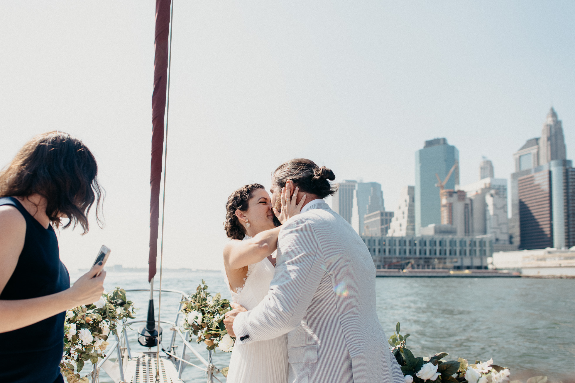 bride and groom first kiss