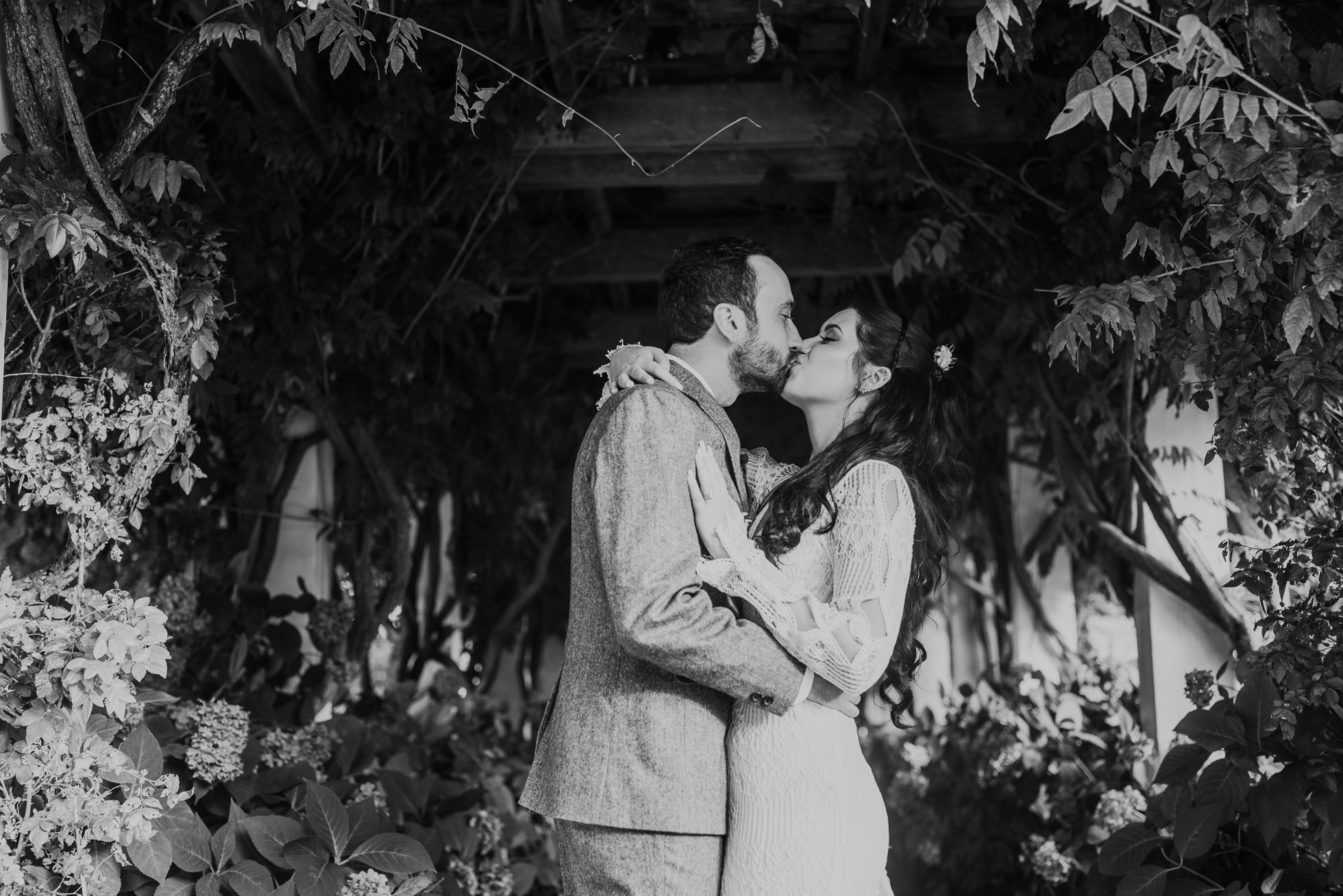 bride and groom kissing