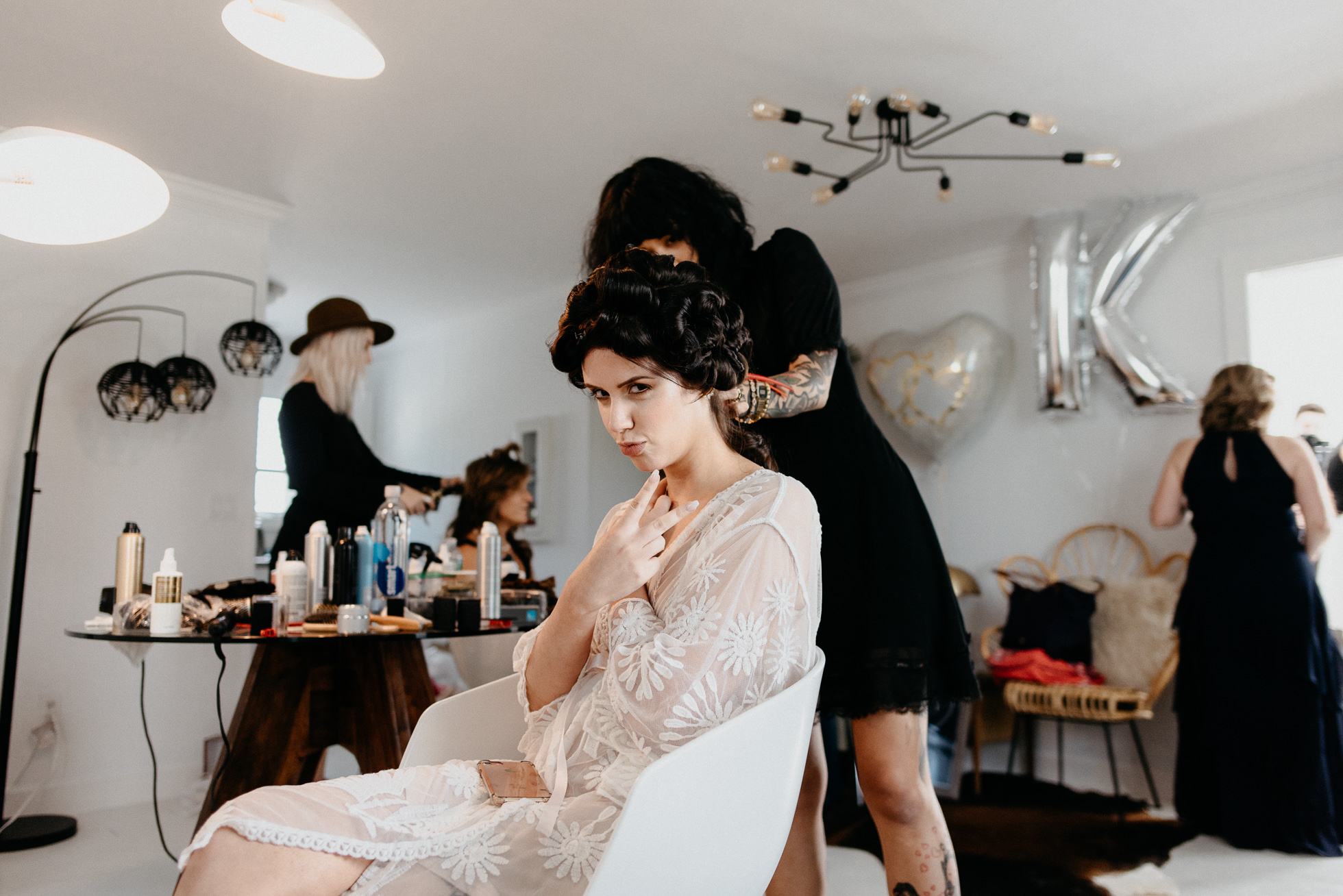 bride getting hair done