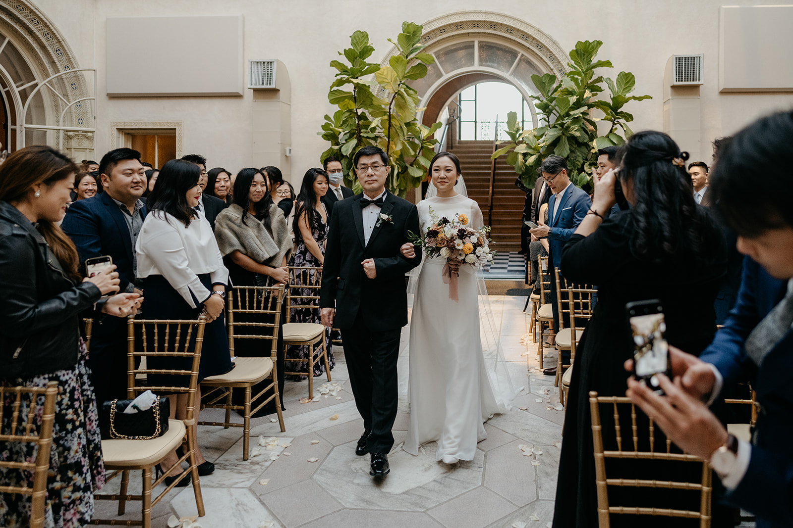 bride coming down aisle